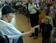 Honor Flight San Diego arrives to a heroes welcome